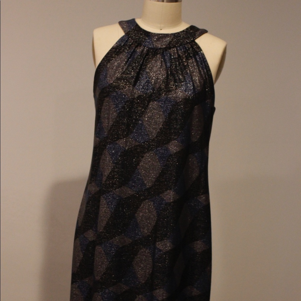 Club attire cocktail dress. Knee length